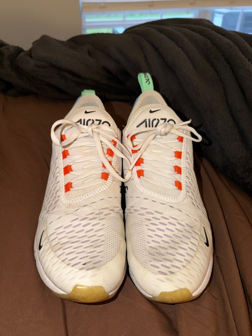 Nike Women's White Athletic Sneakers with Orange Lace Accents and Mint Heel Tabs